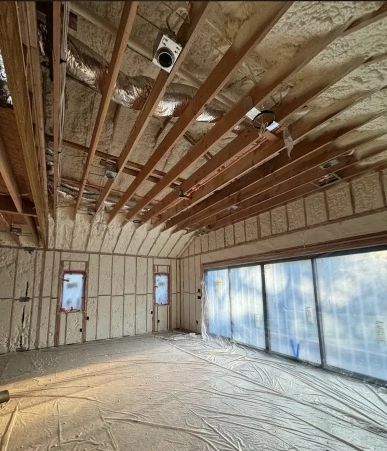 Interior walls and ceiling insulated with spray foam during new construction in Chestnut Ridge